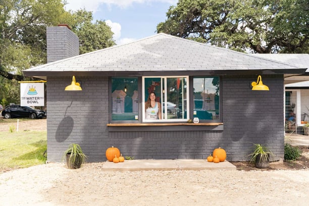 owner Leslie inside the bar at The Watering Hole dog park 