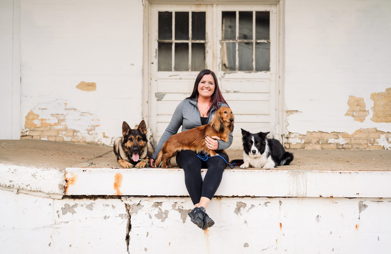 Courtney owner and professional dog trainer with pups