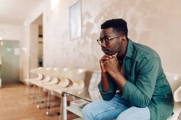 man waiting for clients to show up at his pet boarding business