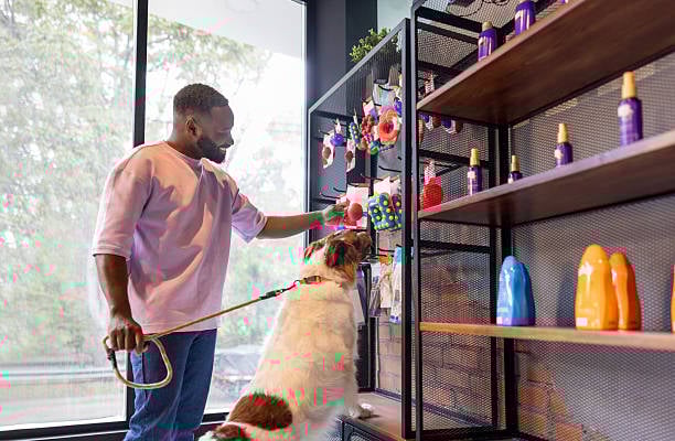 pet parent shopping for retail products with dog