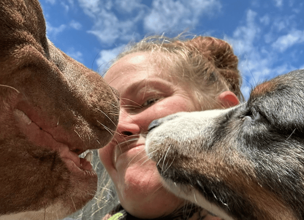 Amanda and dogs taking a selfie at Planet Pup